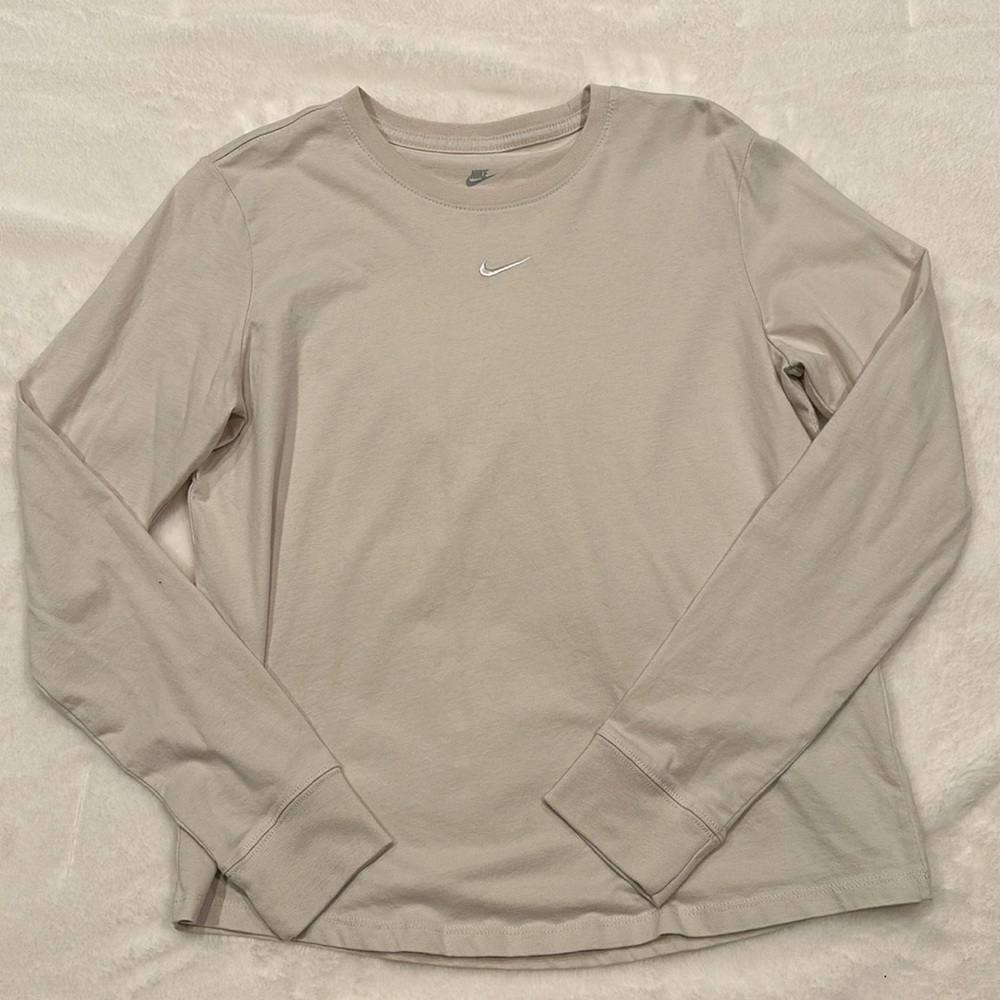 Tan long sleeved Nike shirt